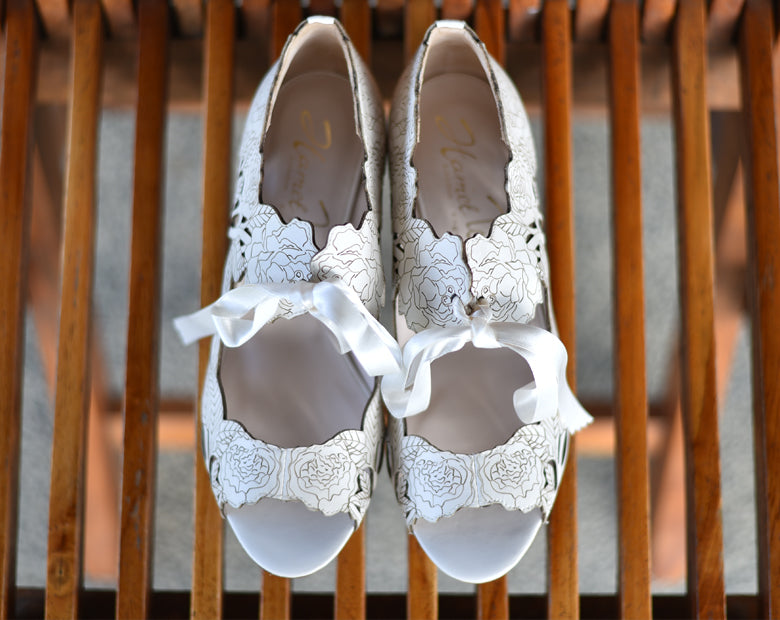 Genie wears Peony Low Ivory