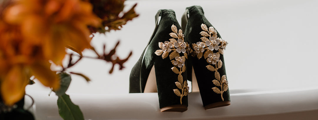 Ashleigh wears Hetty Forest Green Blossom