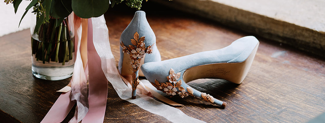 Emily wears Amy Blue Blossom Rose Gold