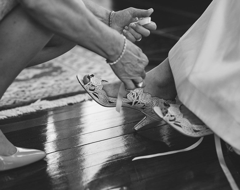 Emily wears Peony Low Ivory