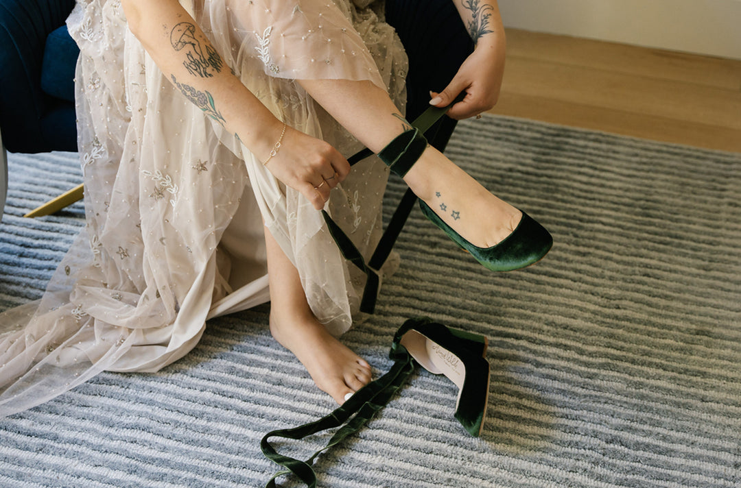 Daniella wears Hetty Mid Forest Green