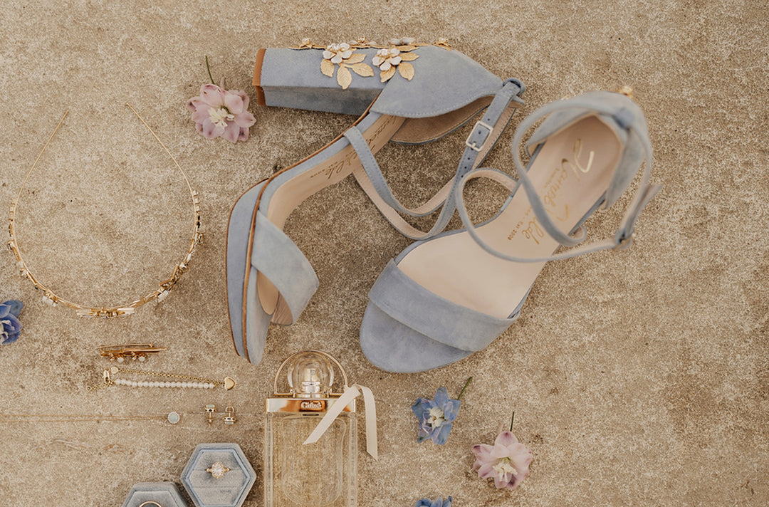 Dulcie wears Arabella Block Blue Blossom Gold