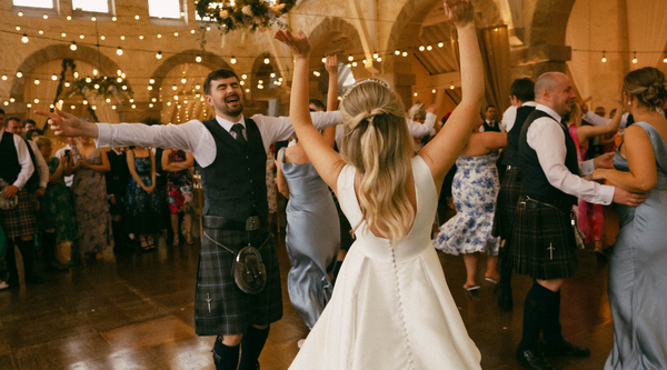 Louise wears Arabella Block Ivory with a Bow