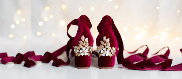 Two Red Luxury Winter Shoes With Ribbons.