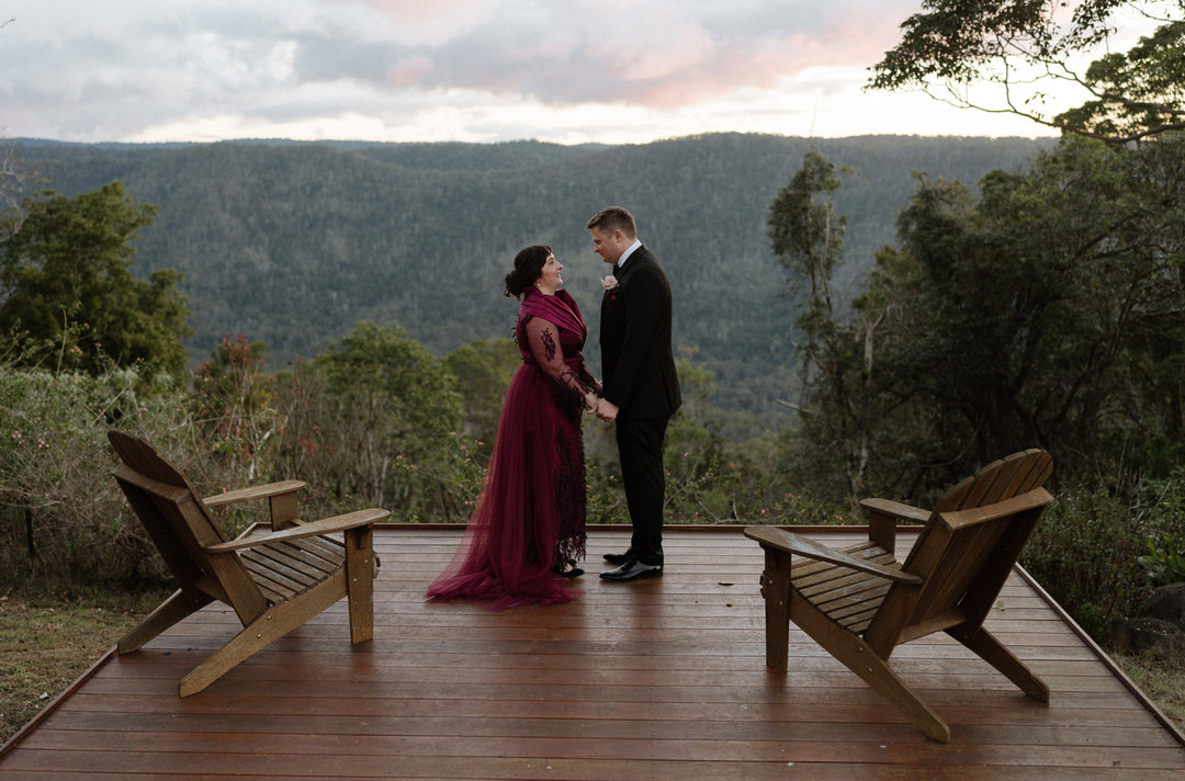 Jacqueline wears Hetty Mid Forest Green Blossom Small Gold