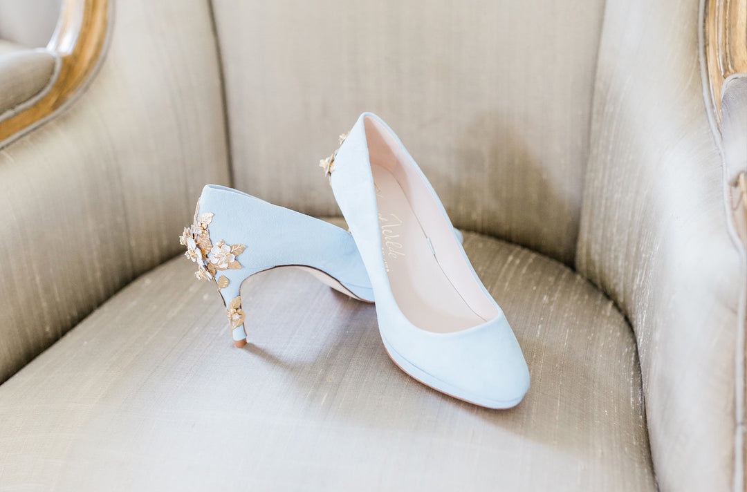 Michaela wears Amy Mid Blue Blossom