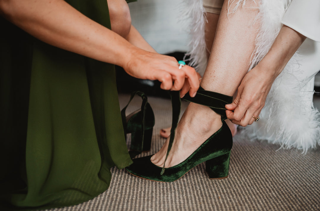Rebecca wears Hetty Mid Forest Green with Amelia clutch & Belle Hair Bow