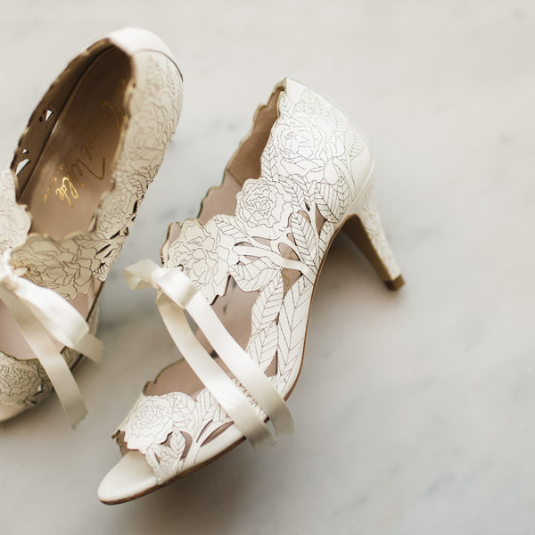 Sarah wears Peony Low Ivory Harriet Wilde Wedding Shoes